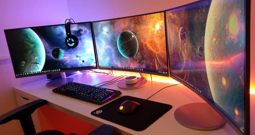 black computer keyboard on brown wooden desk